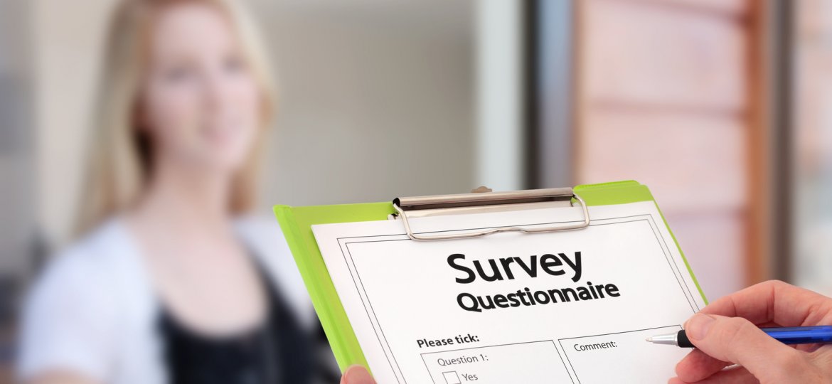Girl Answering Market Research Survey Questionnaire at the Door